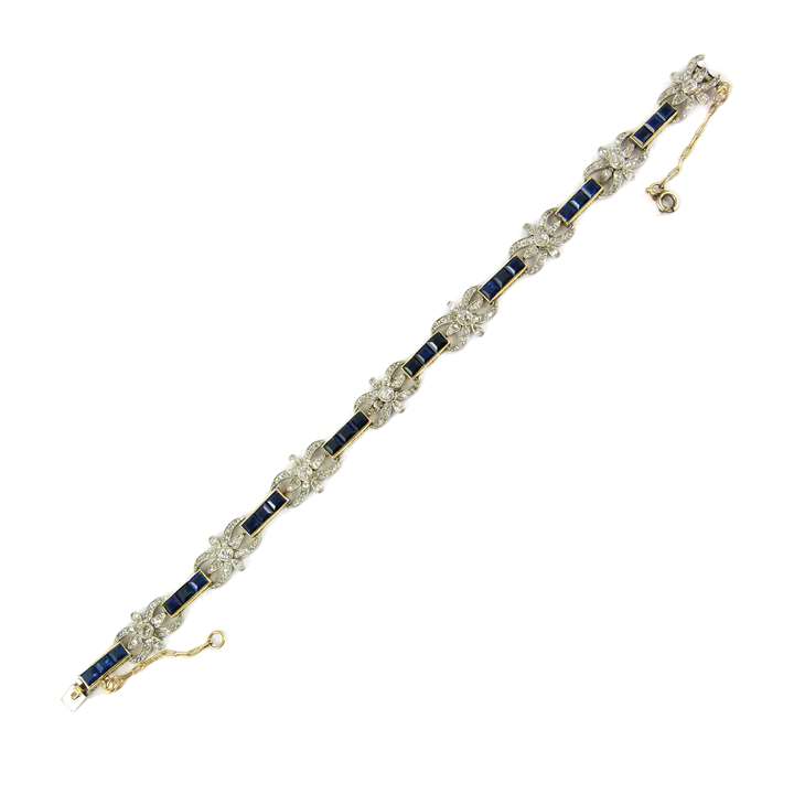 Early 20th century sapphire line and diamond cluster bracelet